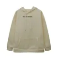 Beige fleece lined hoodie for women with kangaroo pocket and letter print design. - Apricot