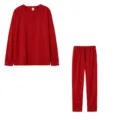 Details of the red long sleeve top and pants casual set, showing fabric texture and cuffs. - Burgundy