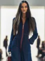 Detail shot of a dark blue denim jumpsuit featuring contrast red stitching and front zip. - S / Blue