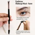 Dual-headed eyebrow brush with angled brush and spoolie for precise makeup application. - Double Ended Brow Brush