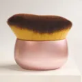 Soft wave makeup brush with pink ergonomic base, ideal for liquid foundation and body tanning application. - Pink