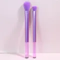 Detail view of purple makeup brush set with crystal glitter handles and soft bristles. - Purple