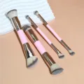 Detailed view of pink double ended makeup brush set featuring soft bristles and rose gold. - 4 Pieces Set