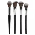 4-piece professional makeup brush set with black handles for powder and foundation application. - 4 Pieces Mixed Color Hair