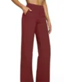 Burgundy high waisted knit wide leg pants detail, casual pocket trousers closeup view. - S / Bottoms / Burgundy