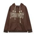 Brown zip-up hoodie with gothic letter graphic and cross symbols, casual loose fit outerwear. - S / Tops / Brown