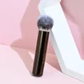 Detail view of the professional soft makeup brush with dense bristles and sleek handle. - Powder Brush-Flame