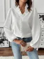 Elegant white long sleeve blouse with romantic ruffles, perfect for chic everyday wear. - S / White