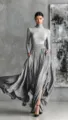 Grey ribbed turtleneck top paired with elegant pleated maxi skirt in modern studio setting. - XS / Gray