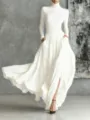 Elegant white long sleeve turtleneck top and pleated maxi skirt set for women, chic two-piece outfit. - White