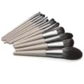 Detailed view of 12pcs professional makeup brush set with soft bristles and sleek handles. - 12 Pieces / Champagne