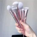 Professional pink makeup brush set with metal handles and soft synthetic bristles for easy use. - 10 Sticks With Laser Bag Set / Pink