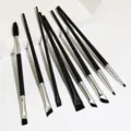 Professional 8-piece makeup brush set featuring angled eyebrow and fine eyeliner brushes. - 8 Pieces Eye Shadow Brushes Set