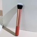Professional makeup foundation brush with rose gold handle and soft synthetic bristles. - Foundation Brush 03