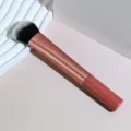 Professional makeup brush with rose gold handle and soft bristles for flawless foundation. - Foundation Brush 04