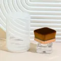Square nail dust brush with rose gold ferrule clear base and protective storage case lid. - Square - Foundation Brush - With Lid