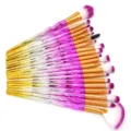 Detail view of 20-piece multi-functional makeup brush set with diamond cut gradient handles. - 20 Pieces Diamond Cut Style / Yellow