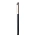 Professional angled makeup brush with black handle and soft synthetic bristles for concealer. - Thumb Concealer Brush