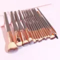 Professional 16-piece makeup brush set with grey handles and rose gold ferrules for precise application. - 16 Pieces Brown OPP