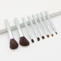 Set mit 8 Mini Make-up-Pinseln, braunen Borsten und hellblauen Griffen für die Reise. - 8-teiliges Set (OPP-Beutel) / Blau