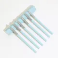 6-piece light blue makeup brush set with cylindrical storage holder for eye makeup tools. - Nordic Green