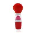 Detailed view of the 2-in-1 makeup brush and sponge tool with vibrant red bristles. - Red