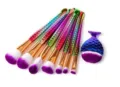 Detailed close-up of colorful mermaid tail makeup brushes with purple bristles for precise blending. - 7Pcs Teardrop Fish Gradient Style