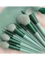 Green makeup brush set, 13 pieces soft face and eye beauty tools with storage pouch. - Green