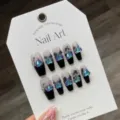 Handmade press-on nails with black French tips, silver bows and sparkling heart gems for stylish wear. - L / Black White Contrast French Cross Heart (901-Medium Coffin)