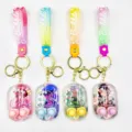 Cute water game capsule keychain with kawaii doll pendant, vibrant silicone strap and keyring. - Magical Girl Water Game Keychain