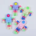 Multi-jointed astronaut fidget sensory toy in assorted pastel colors for stress relief. - Astronaut Spinner / Multicolor