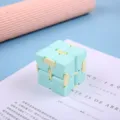Macaron color plastic infinity cube fidget toy detail, perfect for stress relief and fun. - Green