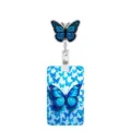 Close-up detail shot of the vibrant blue butterfly ID badge reel and matching card holder. - Blue Butterfly