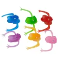 Vista di dettaglio di marionette da dito di dinosauro colorate, giocattoli mostro in gomma mini. - Multicolore
