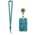 Sunflower print lanyard and ID card holder set with retractable badge reel for office use. - Blue