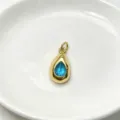 Exquisite teardrop blue crystal pendant with gold-tone frame, delicate detail for necklace. - Pendant Only (Without Chain) / Light Blue