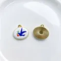 Detailed view of vintage enamel swallow oval pendant charm, retro floral design for DIY necklaces. - Oval Swallow Pendant Only (Without Chain)