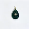 Close-up detail of the carved green teardrop pendant with central stone and gold-tone bail. - Pendant Only (Without Chain) / India Agate