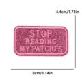 Pink glitter embroidered patch with funny text design, perfect for clothing and bags decor. - Pink Red Stop Reading (PE16503CT)
