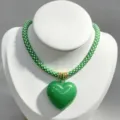 Green white braided rope necklace with glossy green heart pendant jewelry detail view. - B11 Finished Necklace / Green and White Cord with Green Heart