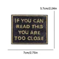 Black glitter embroidered patch with funny English quote, ideal for clothing and bags. - Black Gold Too Close (PE16509CT)