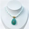 Green teardrop crystal pendant necklace with woven cord stylish gold accents jewelry - Pendant With Chain / Green