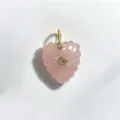 Exquisite carved pink crystal heart pendant detail, featuring gold-plated loop and stones. - Rose Quartz Pendant Only