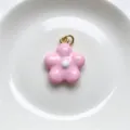 Close-up detail of pink enamel five-petal flower pendant charm for DIY jewelry making accessories. - Pendant Only (No Chain) / Pink