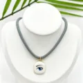 Chic grey cord necklace with gold-trimmed white enamel blue eye pendant for fashion women. - K02-5 (Pendant + Chain in Picture)