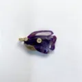 Natural amethyst crystal carved fish pendant detail showing gold and zircon setting close up. - Pendant Only / Amethyst