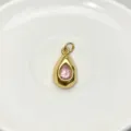 Exquisite teardrop gemstone pendant detail, featuring a glossy gold frame and pink stone. - Pendant Only (Without Chain) / Pink