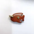 Exquisite natural stone tropical fish carved pendant featuring sparkling inlaid zircon gemstone details. - Pendant Only / Red Jasper