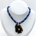 Detailed view of the natural stone fish pendant necklace with blue braided rope and gems. - Pendant Necklace Set (U04) / Blue