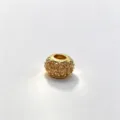 Close-up of gold micro-pave cubic zirconia large hole loose charm bead for DIY jewelry. - Single Accessory / Gold (D04)